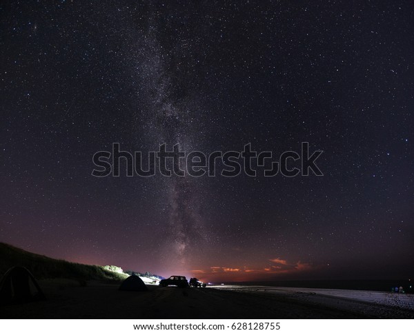 Milky Way over the\
camp on the Baltic beach