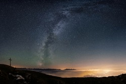 The Milky Way Over The City Of Innsbruck Seen From The Mountains At Night