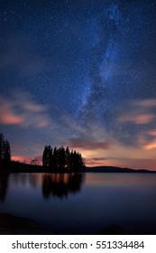 Milky Way over the lake /
Long time exposure night landscape with Milky Way Galaxy above the Shiroka Polyana dam, Bulgaria - Shutterstock ID 551334484