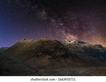 Milky Way Over The Mountains Of Glencoe, Highlands, Scotland, Uk.