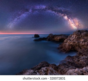 Milky Way over the sea. Long time exposure night landscape with Milky Way Galaxy above the Black sea - Shutterstock ID 320072831