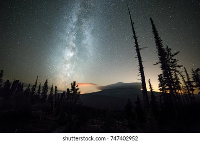 Milky Way Over A Shrouded Mt. Hood And Night Sky With Stars
