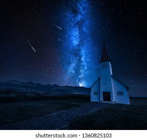 Milky way over small church in mountain, Iceland in summer - Powered by Shutterstock