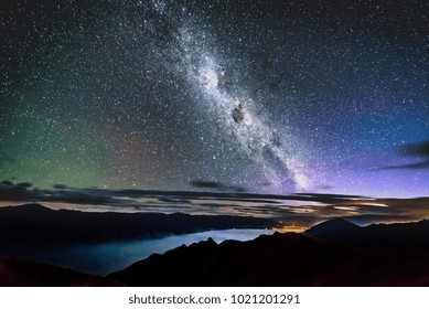 Milky Way panoramic from Isthmus Peak over lake Wanaka - Powered by Shutterstock
