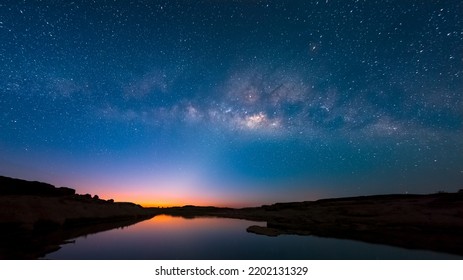 Milky way and sunrise over Sam Pan Bok canyon, Ubon ratchathani, Thailand - Powered by Shutterstock