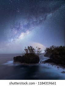 Milkyway above the small island " Roche du Pas de Cabri" in Sainte-Rose, Reunion Island
