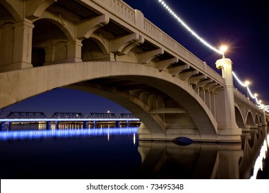 Mill Avenue Bridge across the Salt River in  Tempe Arizona photographed at sunset.