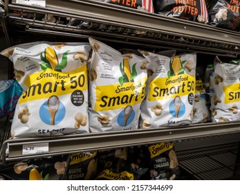 Mill Creek, WA USA - Circa May 2022: Angled View Of Smartfood Brand Popcorn For Sale Inside The Chip Aisle Of A Town And Country Grocery Store.