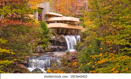 MILL RUN, PENNSYLVANIA, USA - OCTOBER 24, 2017: Fallingwater over Bear Run waterfall in the Laurel Highlands of the Allegheny Mountains.