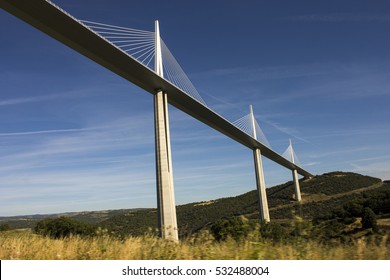 The Millau Viaduct, a cable-stayed bridge that spans the valley of the River Tarn near Millau in southern France. It is the tallest bridge in the world with one mast's summit at 343 m.