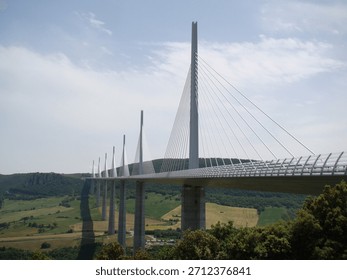 The Millau Viaduct, a multispan cable-stayed bridge completed in 2004 across the gorge valley of the Tarn near (west of) Millau in the Aveyron department in the Occitanie Region, in Southern France - Powered by Shutterstock - Get 15% off with code: PIKWIZARD15