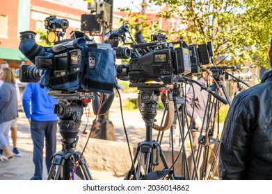 Millburn, New Jersey, USA - September 3, 2021: TV Crew And Cameras Await Governor Phil Murphy Press Conference Regarding Tropical Storm IDA In Millburn New Jersey. People Can Be Seen.