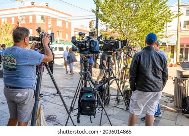 Millburn, New Jersey, USA - September 3, 2021: TV Crew And Cameras Await Governor Phil Murphy Press Conference Regarding Tropical Storm IDA In Millburn New Jersey. People Can Be Seen.