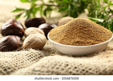 Milled Nutmeg Powder Served In White Bowl 