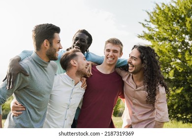 Millenial Male Friends Having Fun Outside On Campus University - Focus On Guy Face With White Shirt