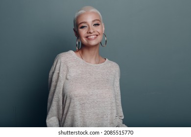 Millenial Young Woman With Short Blonde Hair Smiling Portrait