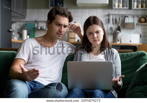 Millennial Couple Annoyed By Stuck Laptop Stock Photo (Edit Now) 1095874271