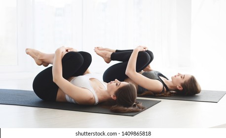 Millennial Girls Having Relax Time Laying On The Back After Hard Yoga Exercises, Yoga Concept, Copy Space