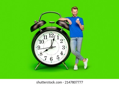 Millennial guy use telephone stand near clock isolated on chroma key background. Creative art collage app device concept