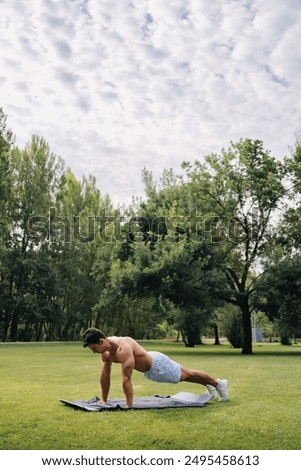 Similar – Portrait of a young man in nature