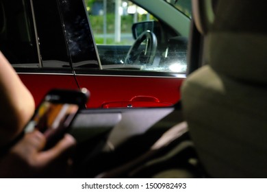 Millennial Smart Phone User In Car