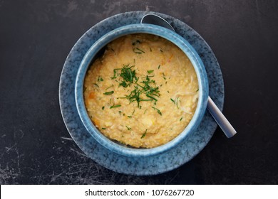 Millet Cereal In Stoneware Bowl Shot From Above, Russian Cuisine Dish