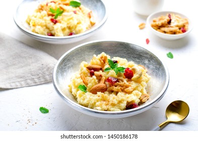 Millet Porridge With Nuts, Honey And Cinnamon, Tasty Breakfast