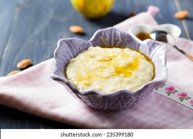 Millet Porridge With Pear And Maple Syrup