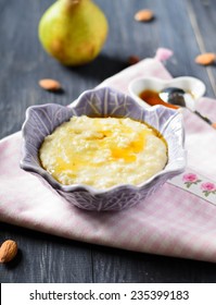 Millet Porridge With Pear And Maple Syrup