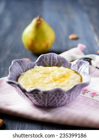 Millet Porridge With Pear And Maple Syrup