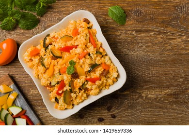 Millet With Vegetables And Raisins. Top View. 