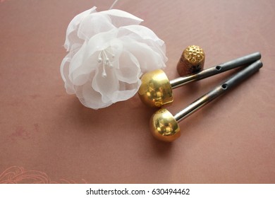 Millinery and Hat Making Tools, Silk Flowers and Thimble - Powered by Shutterstock