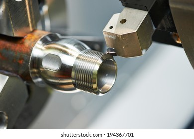 milling detail on metal cutting machine tool at factory
