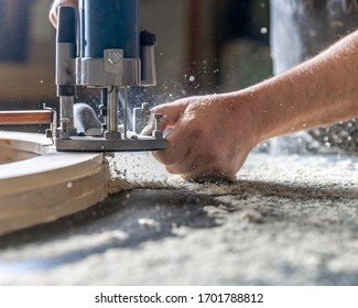 Milling Wood In The Joinery Using Manual Mechanical Cutters. Flying Sawdust In The Air