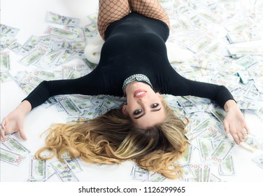 Millionaire, Billionaire, Wealthy Sensual Woman With Many Banknote. Rich Woman. Businesswoman In Black Costume Lying In Banknotes. Bank Concept. Saving Money Concept. Business Concept. Erotic Lingerie