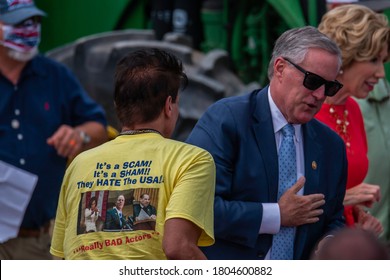 Mills River, North Carolina - 24 August 2020: A Support With A Politicized Shirt Waits To Speak With The White House Chief Of Staff, Mark Meadows