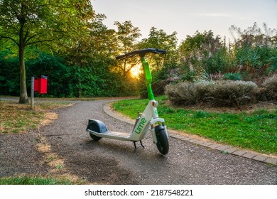 Milton Keynes, England-August 2022: A Green Lime-S Electric Scooter Is Ready For The Next Person In Milton Keynes Park