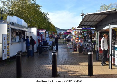 Milton Keynes, UK: Oct 22, 2022.  Overpriced Street Food And Drink Attracts Less Low Income People In An Open Market In The City Centre Of Milton Keynes. 