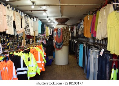 Milton Keynes, UK: Oct 22, 2022.  More Low Income People Buy Cheaper Clothes From Markets In Order To Save Money In A Cost Of Living Crisis.  