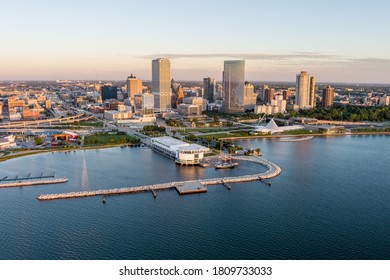 Milwaukee, WI - 3 September 2020:  Image from a drone of the Milwaukee skyline from lake Michigan during sunrise including US Bank, Milwaukee Art Museum and Northwestern Mutual buildings