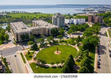 Milwaukee, WI / USA - June 29, 2020: Aerial View Of The Burns Commons Featuring Robert Burns By William Grant Stevenson And  “Cleopatra’s Wedge” By Beverly Pepper