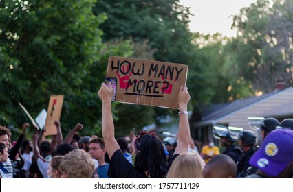 Milwaukee, Wisconsin - 06/16/20: Signs At A Protest Fighting Against Racial Inequity, Injustice And Police Brutality, Also Justice For Black People Who Have Died In The Hands Of Police