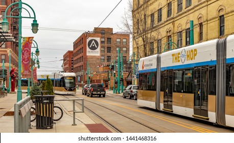 Milwaukee, Wisconsin - April 10th, 2019 - "The Hop" - MKE public transit streetcar at Milwaukee Public Market, Third Ward Station in Downtown Milwaukee.