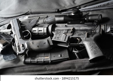 Milwaukee, Wisconsin - January 14, 2021: Loaded self defense firearms in a tactical bag