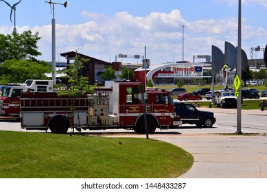 Milwaukee, Wisconsin / USA - July 11, 2019:  A Firetruck Engine 34 Parked Downtown Milwaukee By The Summerfest Grounds On A Sunny Summer Day. 