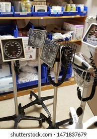 Milwaukee, Wisconsin / USA - July 12, 2019: Hospital Supply Closet With Four Aneroid Blood Pressure Monitors.