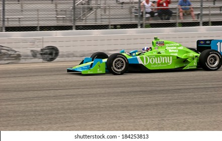 MILWAUKEE, WISCONSIN, USA - JUNE 19, 2011: No. 10 Dario Franchitti, United Kingdom Chip Ganassi Racing