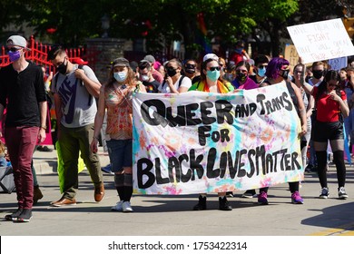 Milwaukee, Wisconsin / USA - June 7th, 2020: LGBT and non-LGBT wisconsinites came out to the black lives matter and lgbt march in support the end the death of lgbt and black lives of police brutality 