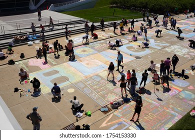 Milwaukee, Wisconsin / USA - June 7th, 2020: Community members of the milwaukee area came out to milwaukee art museum to show support and solidarity for black lives matter by creating chalk murals.