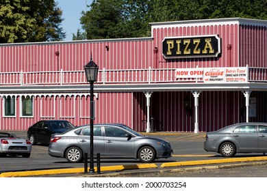 Milwaukie, OR, USA - Jun 18, 2021: The Vintage PIZZA Sign Is Seen At Pietro's Pizza Parlor In Milwaukie, Oregon. Pietro's Pizza Is A Small Pizza Chain Founded In 1957 In The State Of Oregon.